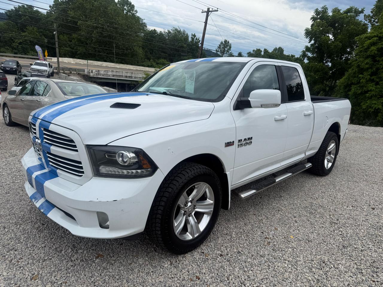 RAM 1500 4WD Quad Cab 140.5" Sport 2014