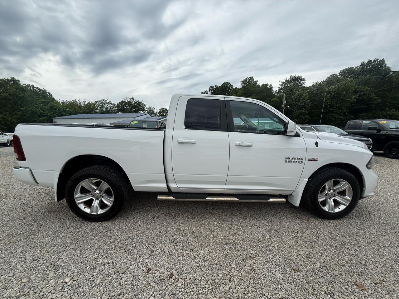 RAM 1500 4WD Quad Cab 140.5" Sport 2014