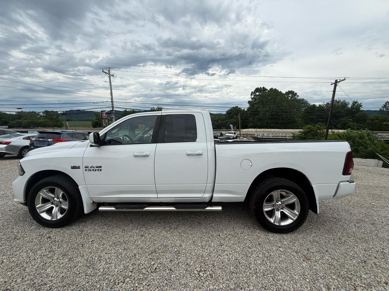 RAM 1500 4WD Quad Cab 140.5" Sport 2014