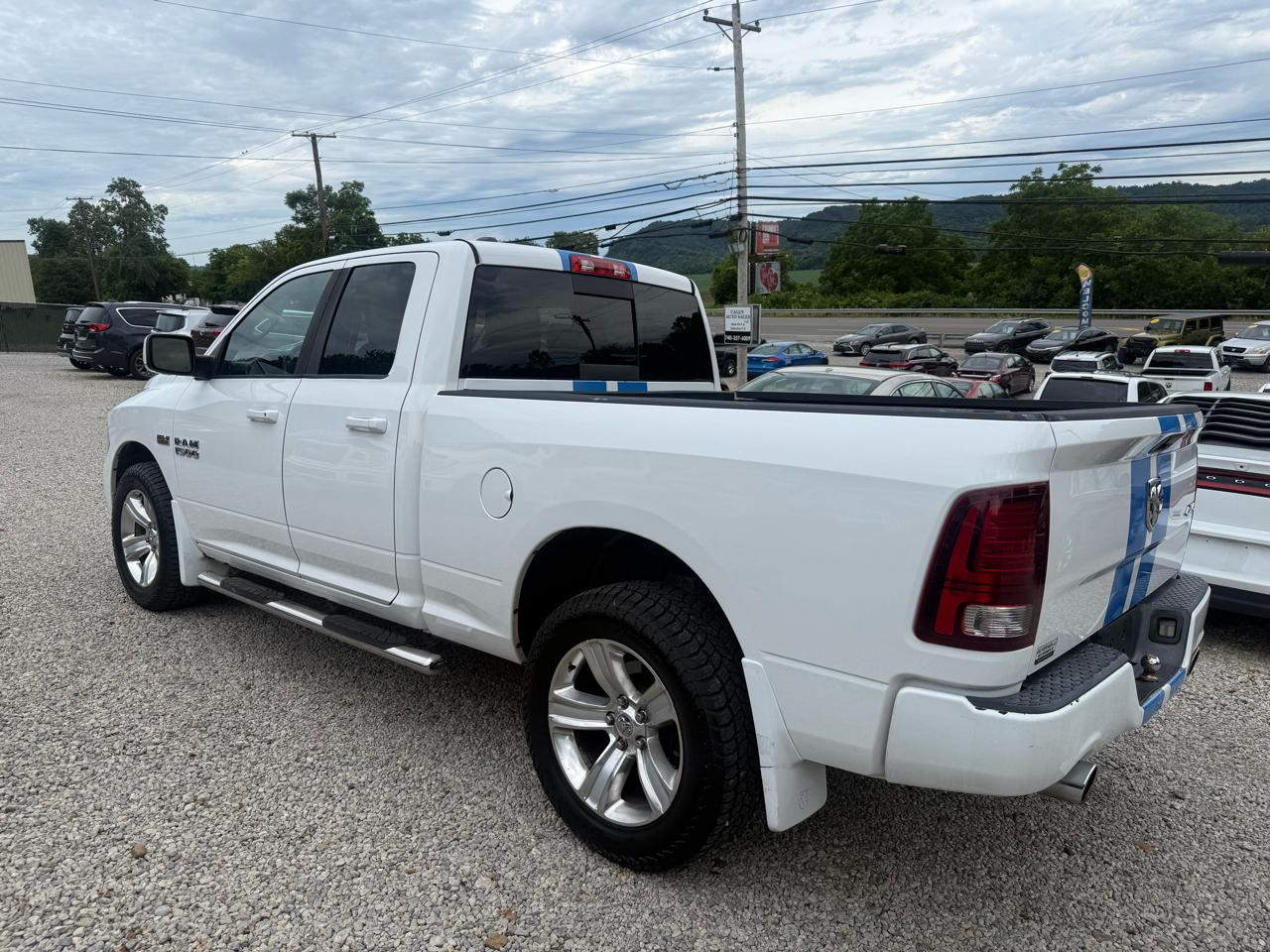 RAM 1500 4WD Quad Cab 140.5" Sport 2014