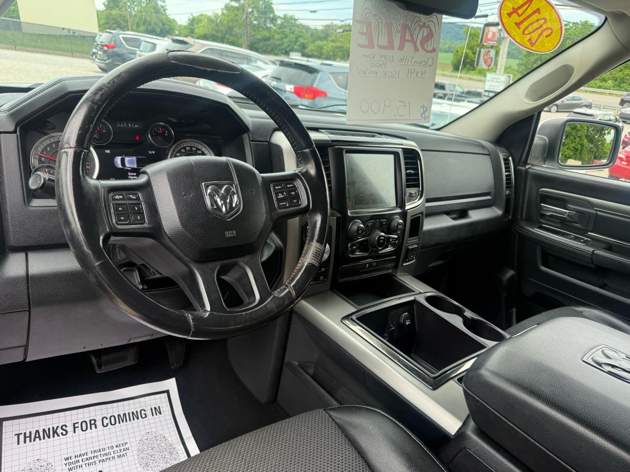 RAM 1500 4WD Quad Cab 140.5" Sport 2014