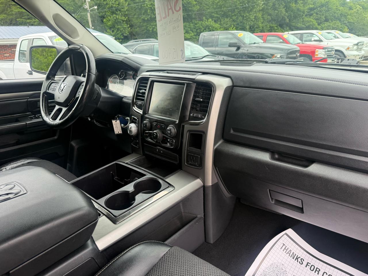 RAM 1500 4WD Quad Cab 140.5" Sport 2014