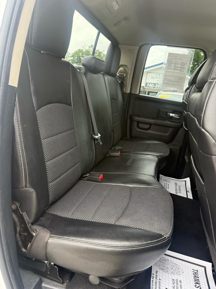 RAM 1500 4WD Quad Cab 140.5" Sport 2014