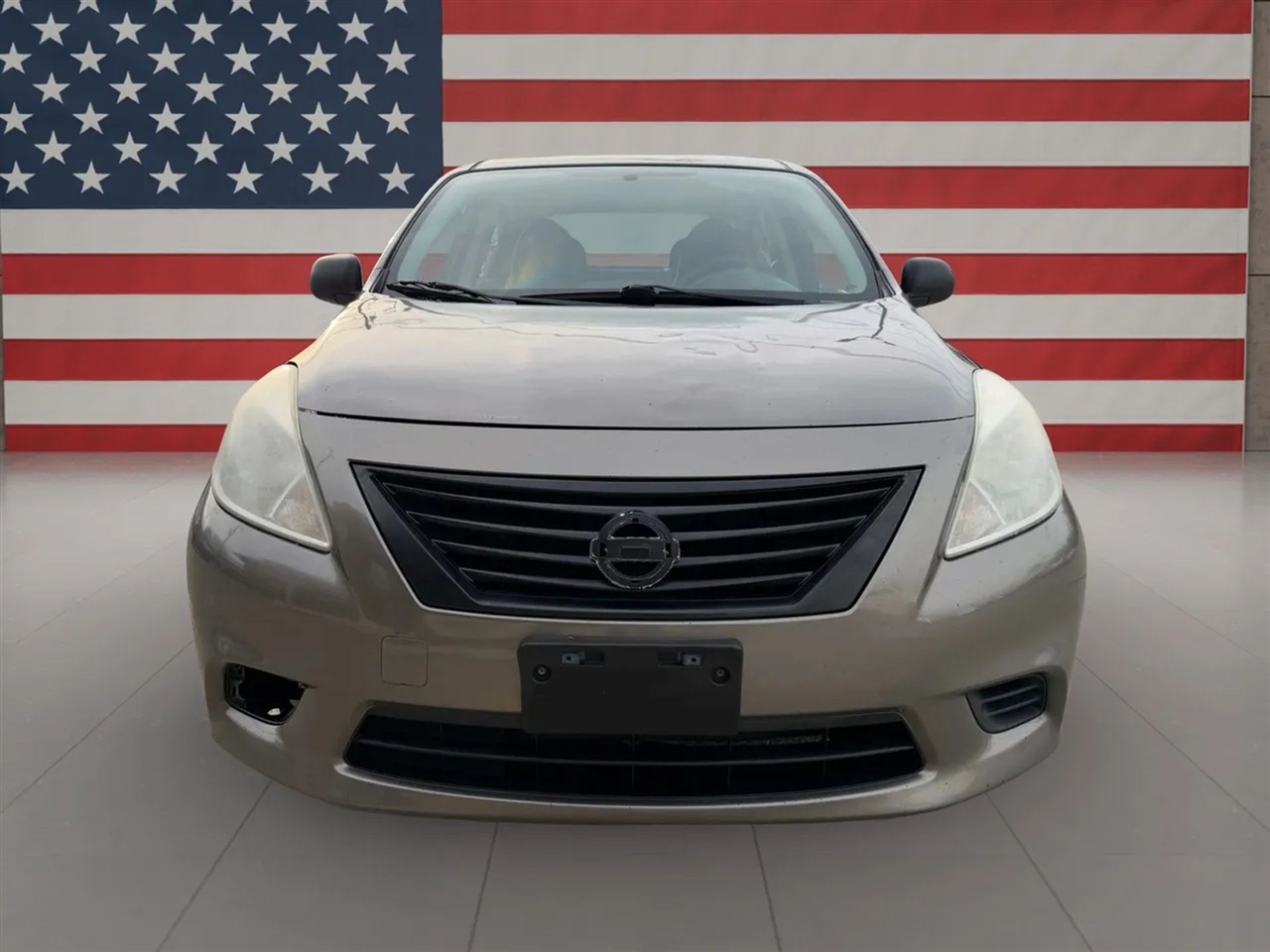 2013 Nissan Versa Sedan S Plus's photo