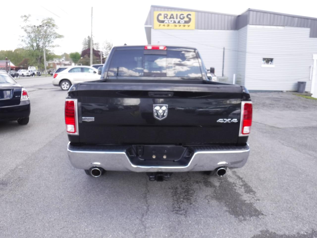 RAM 1500 4WD Crew Cab 140.5" Laramie 2016
