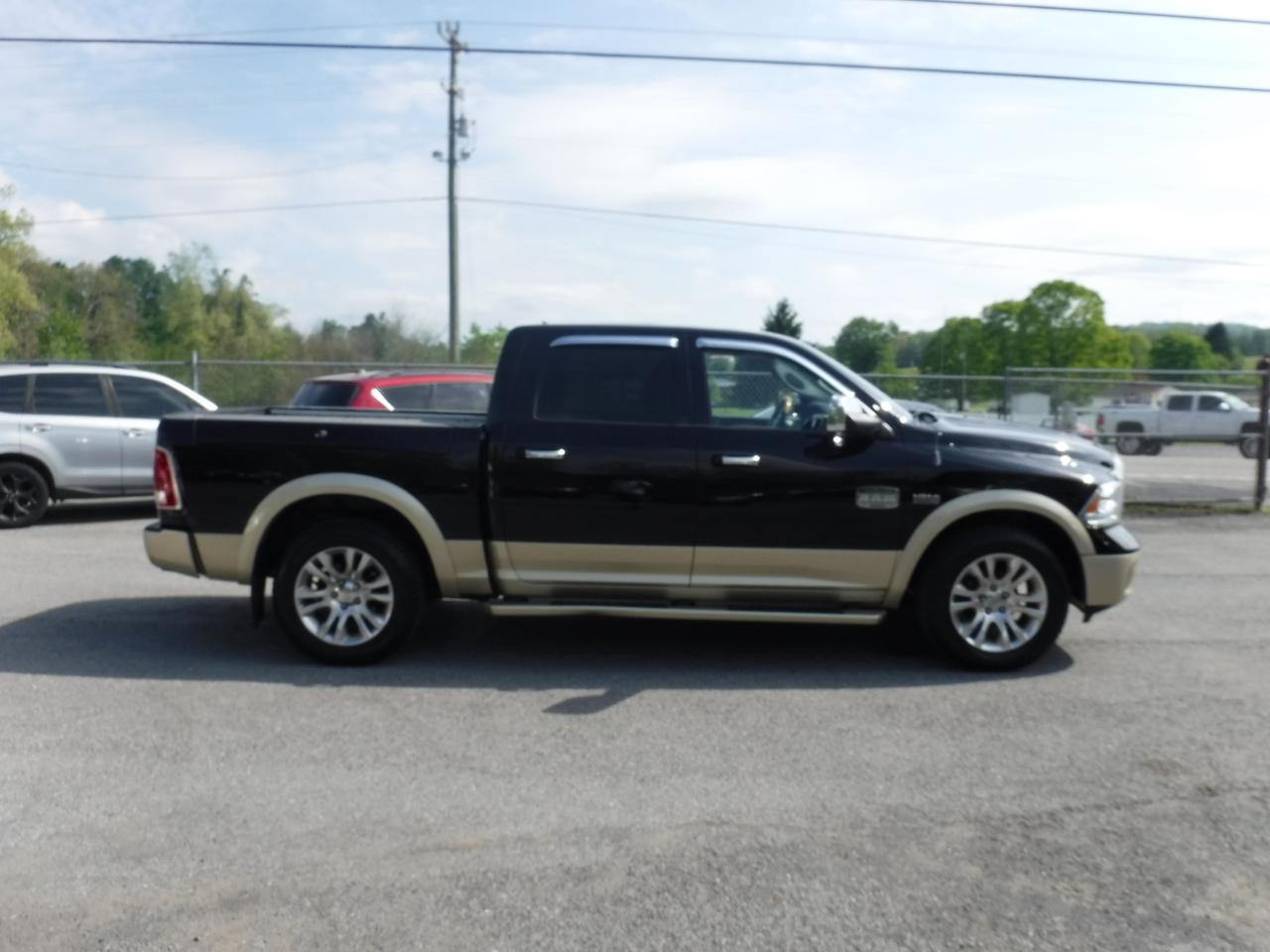 RAM 1500 4WD Crew Cab 140.5" Laramie Longhorn Edition 2013