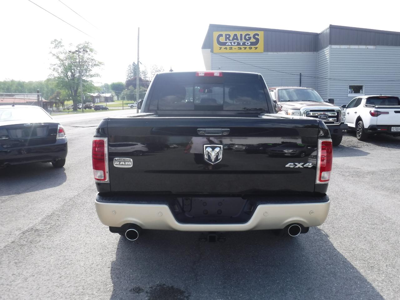 RAM 1500 4WD Crew Cab 140.5" Laramie Longhorn Edition 2013