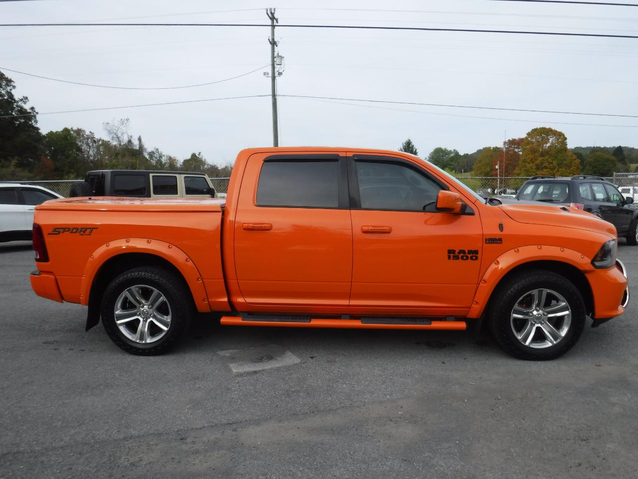 RAM 1500 4WD Crew Cab 140.5" Sport 2015