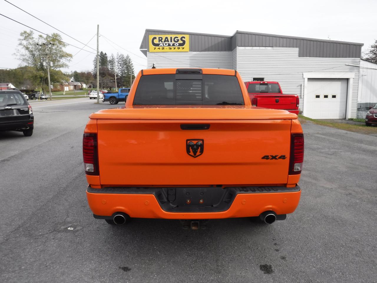 RAM 1500 4WD Crew Cab 140.5" Sport 2015