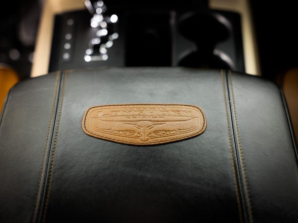 RAM 1500 4WD Crew Cab 140.5" Laramie Longhorn Edition 2013