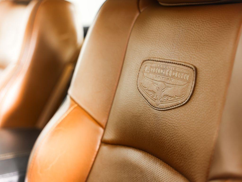 RAM 1500 4WD Crew Cab 140.5" Laramie Longhorn Edition 2013