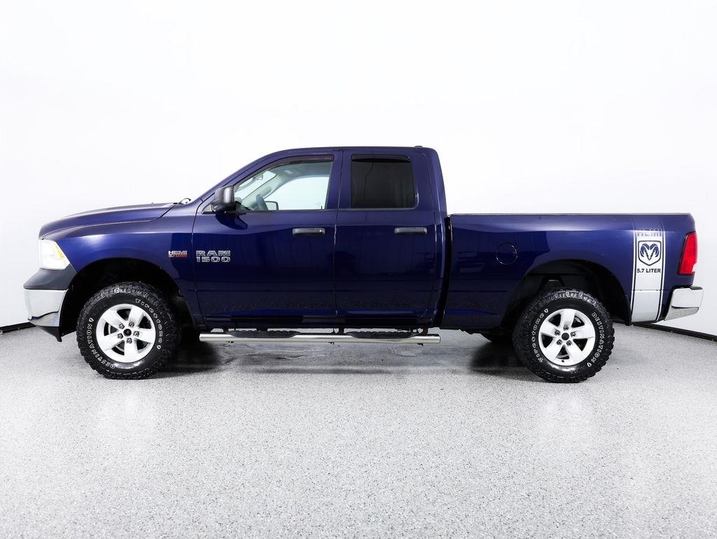 RAM 1500 4WD Quad Cab 140.5" Tradesman 2015