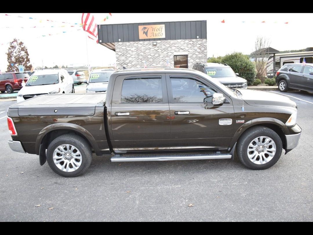 2013 RAM 1500 4WD Crew Cab 140.5" Laramie Longhorn Edition