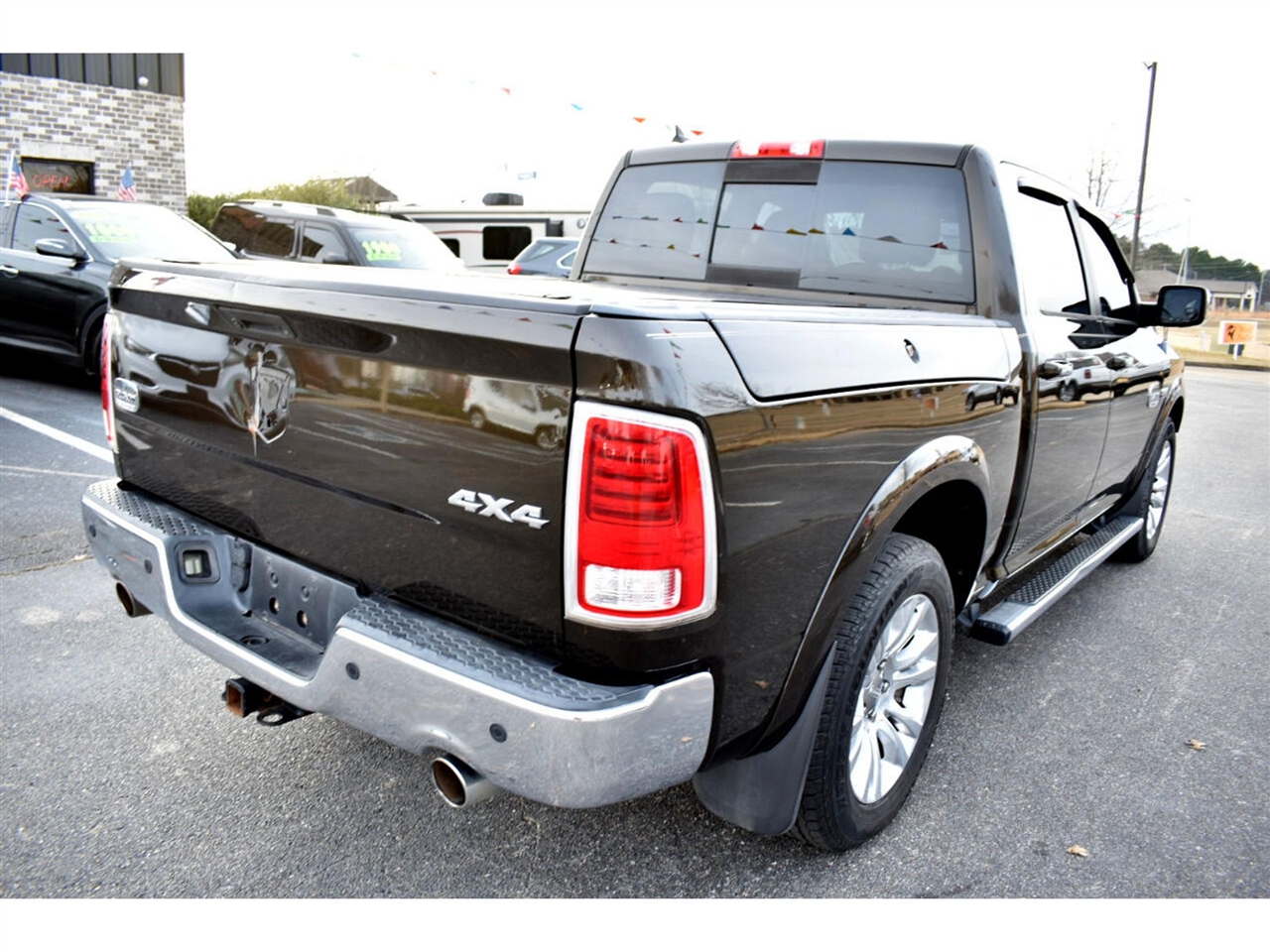 RAM 1500 4WD Crew Cab 140.5" Laramie Longhorn Edition 2013