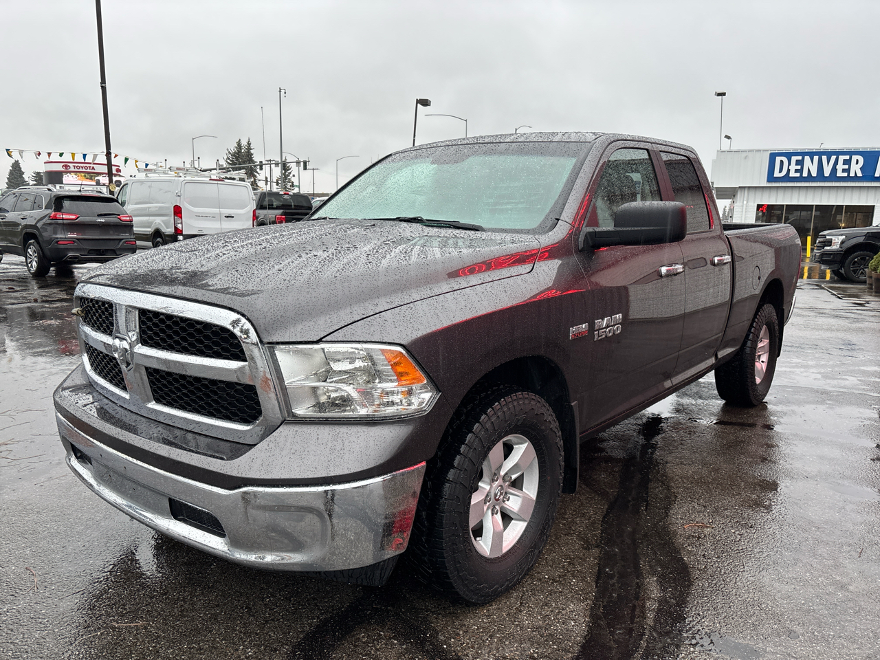 RAM 1500 4WD Quad Cab 140.5" SLT 2017