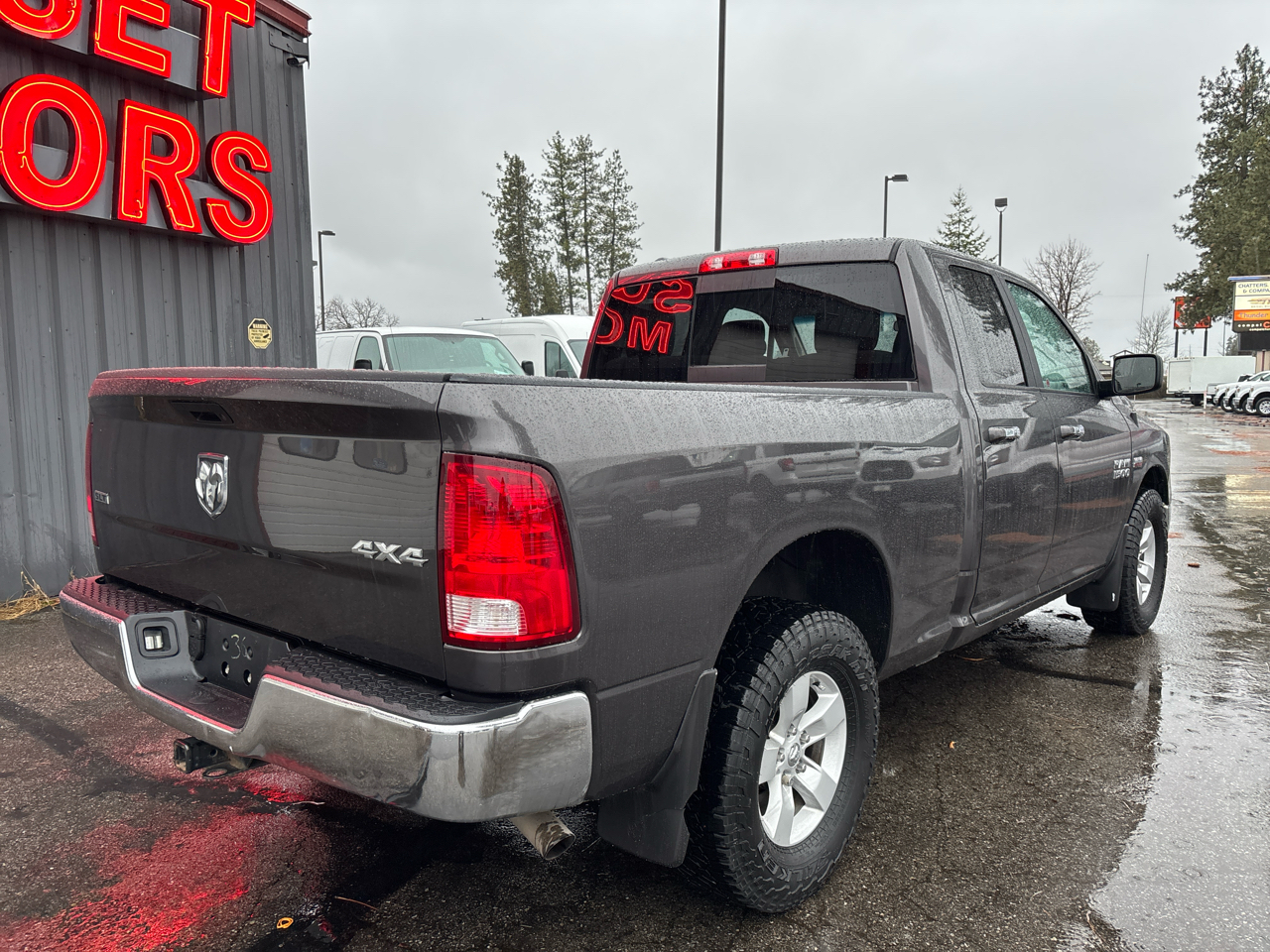 RAM 1500 4WD Quad Cab 140.5" SLT 2017