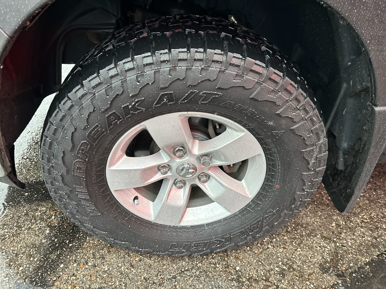 RAM 1500 4WD Quad Cab 140.5" SLT 2017