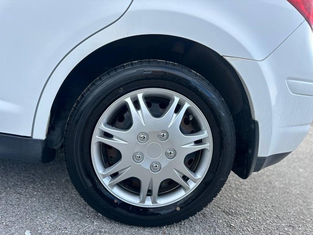 Nissan Versa 5dr HB Auto 1.8 S 2012