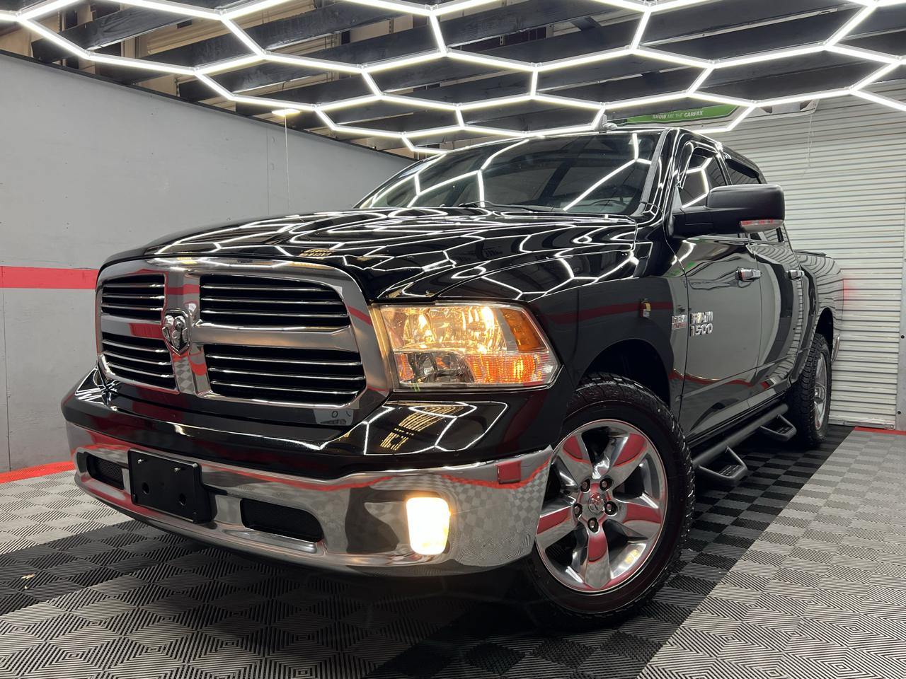 2015 RAM 1500 4WD Quad Cab 140.5" Big Horn