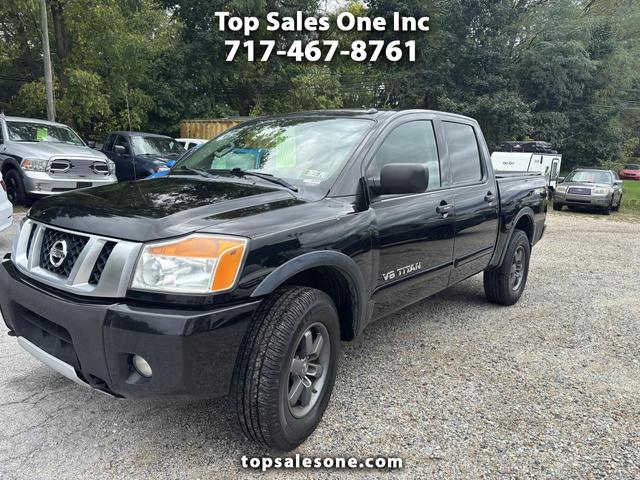 Black 2013 Nissan Titan Pickup Truck Four-Wheel Drive