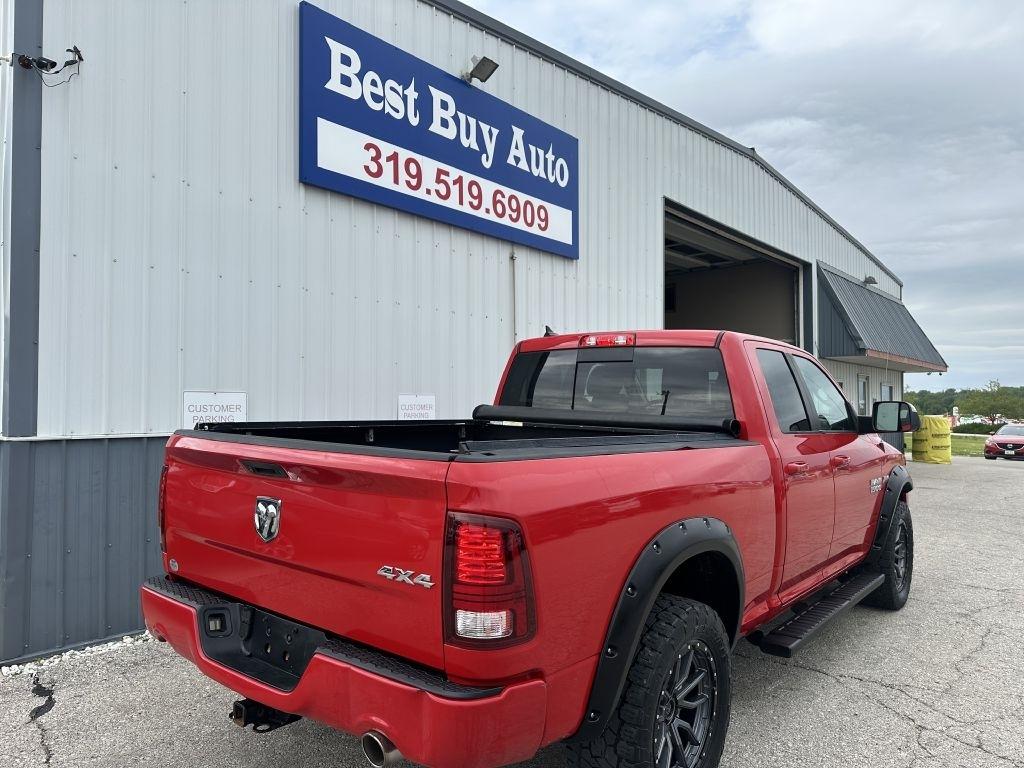 RAM 1500 4WD Quad Cab 140.5" Sport 2016