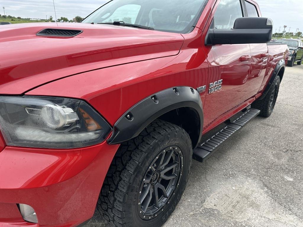RAM 1500 4WD Quad Cab 140.5" Sport 2016