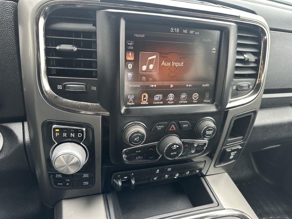 RAM 1500 4WD Quad Cab 140.5" Sport 2016