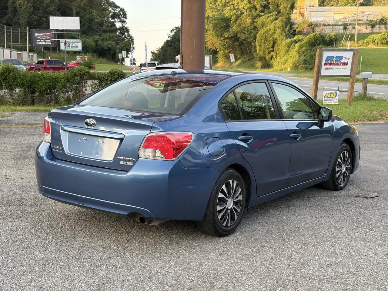 Subaru Impreza 2.0i 4-door Manual 2014