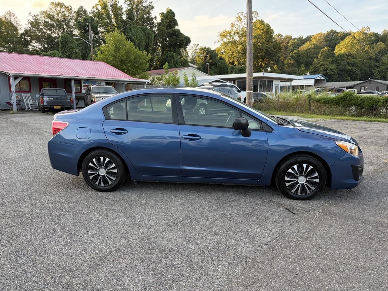 Subaru Impreza 2.0i 4-door Manual 2014