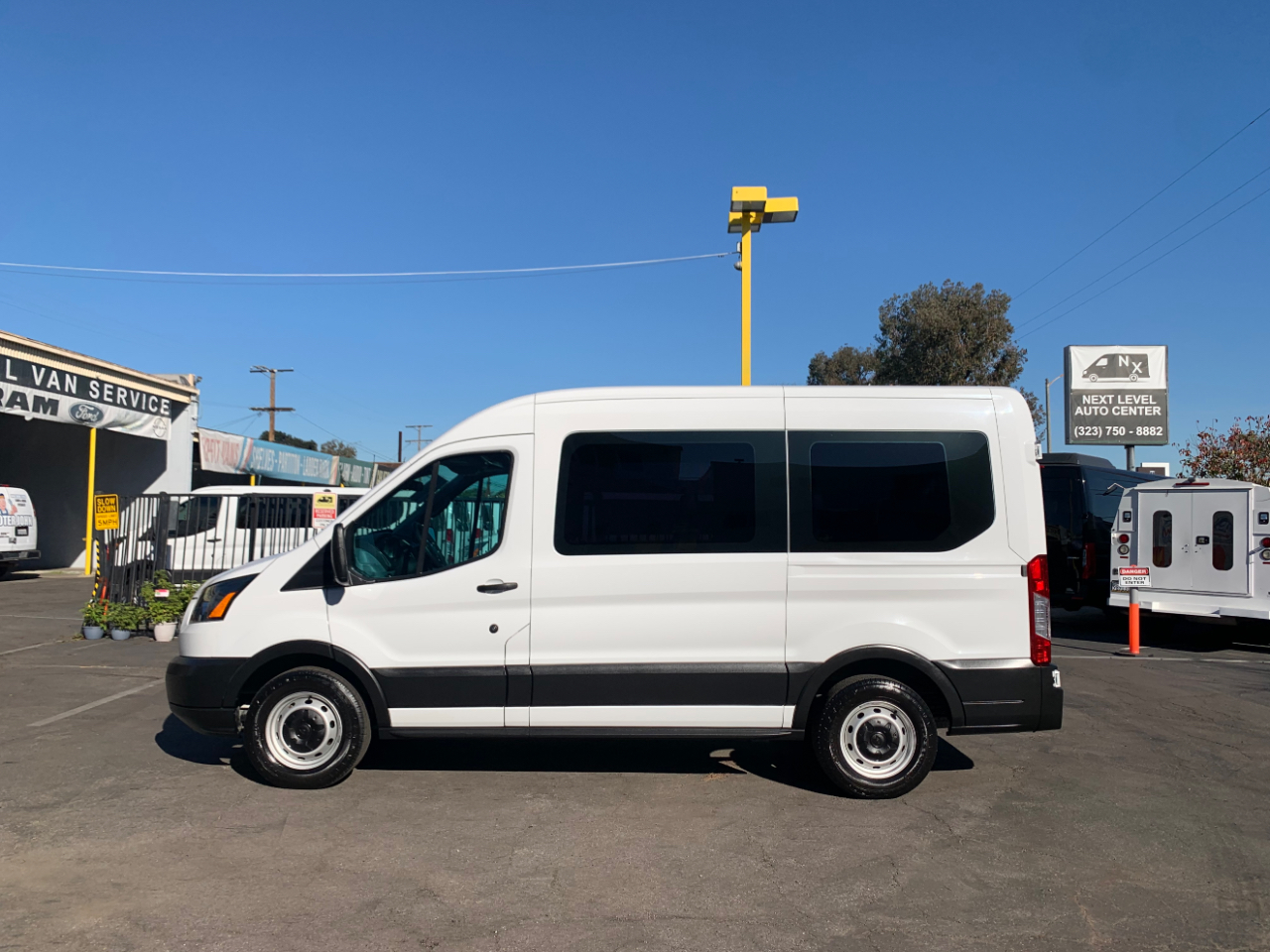 Ford Transit Passenger Wagon T-150 130" Med Roof XLT Sliding RH Dr 2019