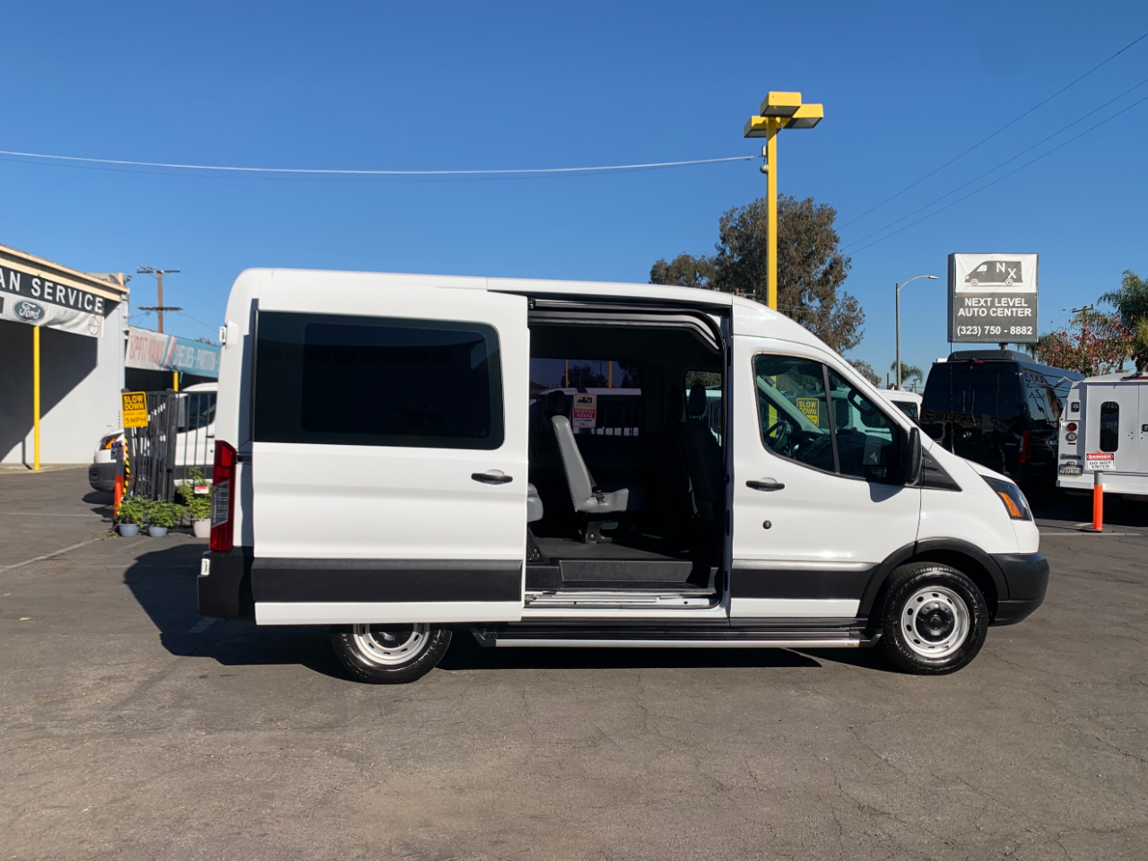 Ford Transit Passenger Wagon T-150 130" Med Roof XLT Sliding RH Dr 2019