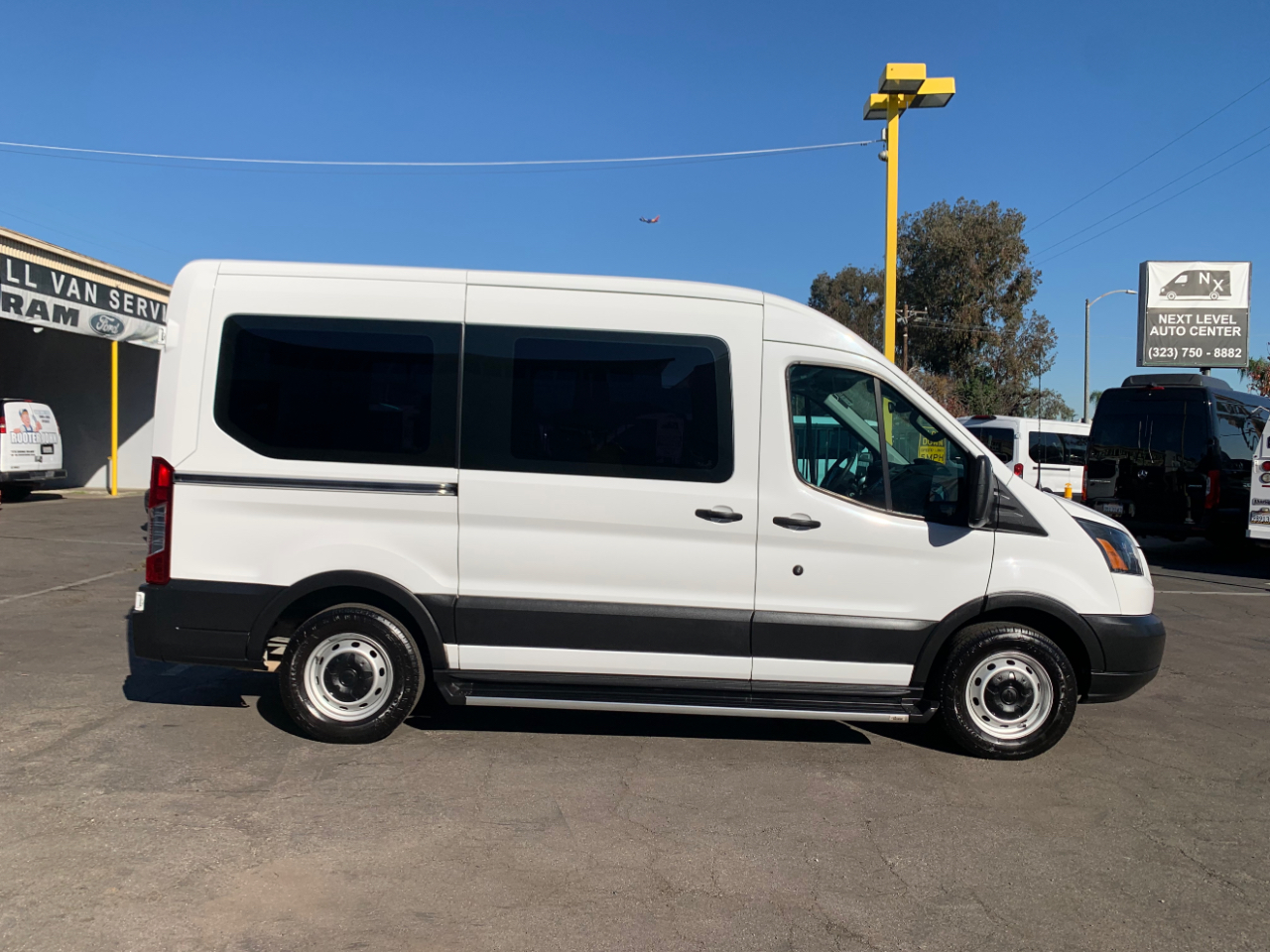 Ford Transit Passenger Wagon T-150 130" Med Roof XLT Sliding RH Dr 2019