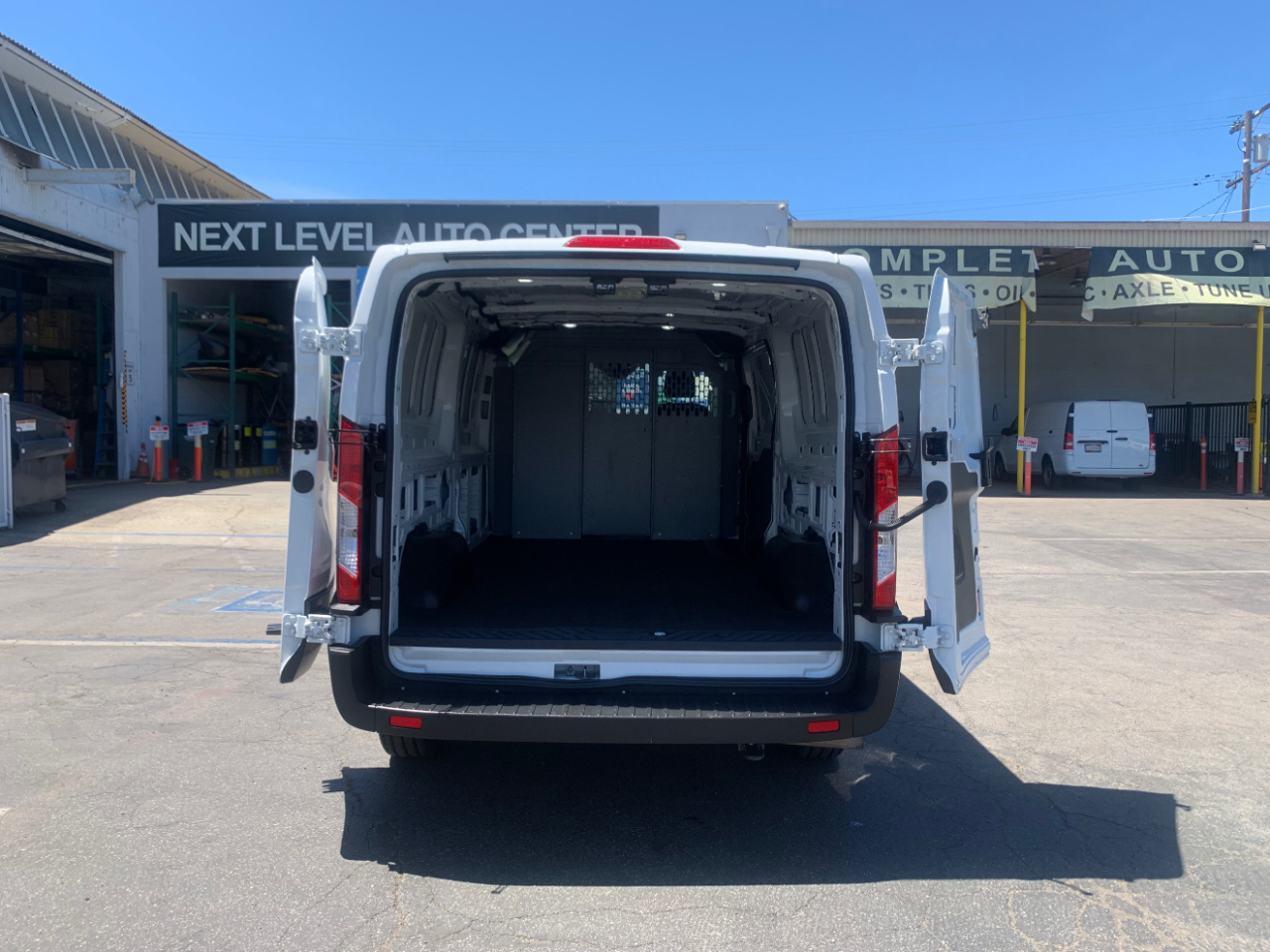 Ford Transit Cargo Van T-150 148" Low Rf 8670 GVWR RWD 2020