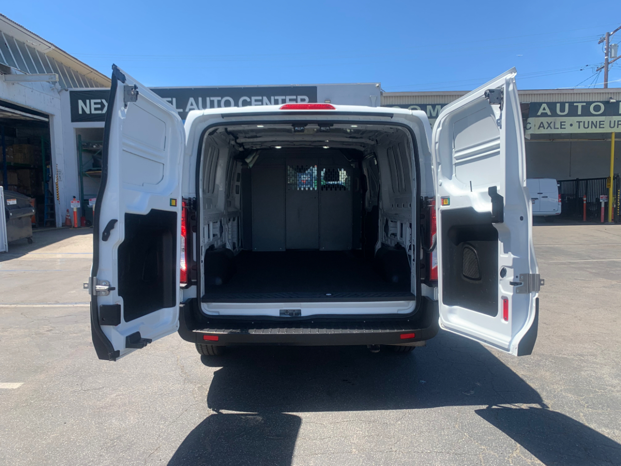 Ford Transit Cargo Van T-150 148" Low Rf 8670 GVWR RWD 2020