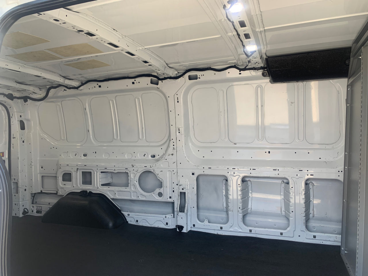 Ford Transit Cargo Van T-150 148" Low Rf 8670 GVWR RWD 2020