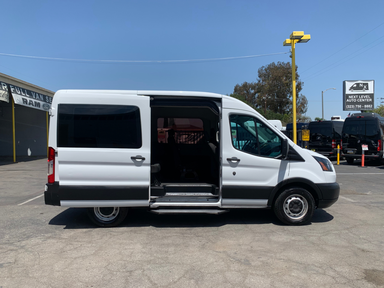 Ford Transit Passenger Wagon T-150 130" Med Roof XLT Sliding RH Dr 2019