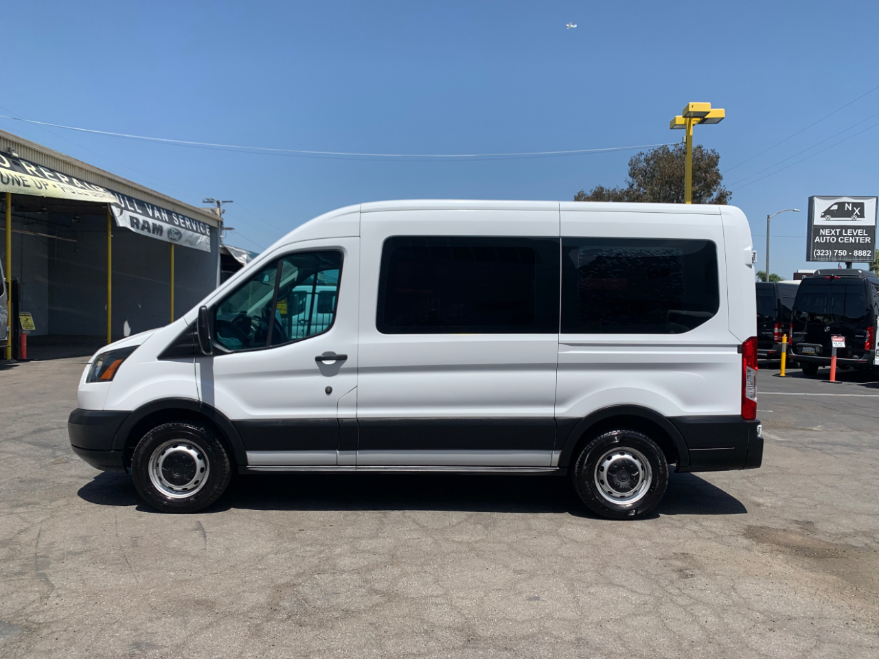 Ford Transit Passenger Wagon T-150 130" Med Roof XLT Sliding RH Dr 2019
