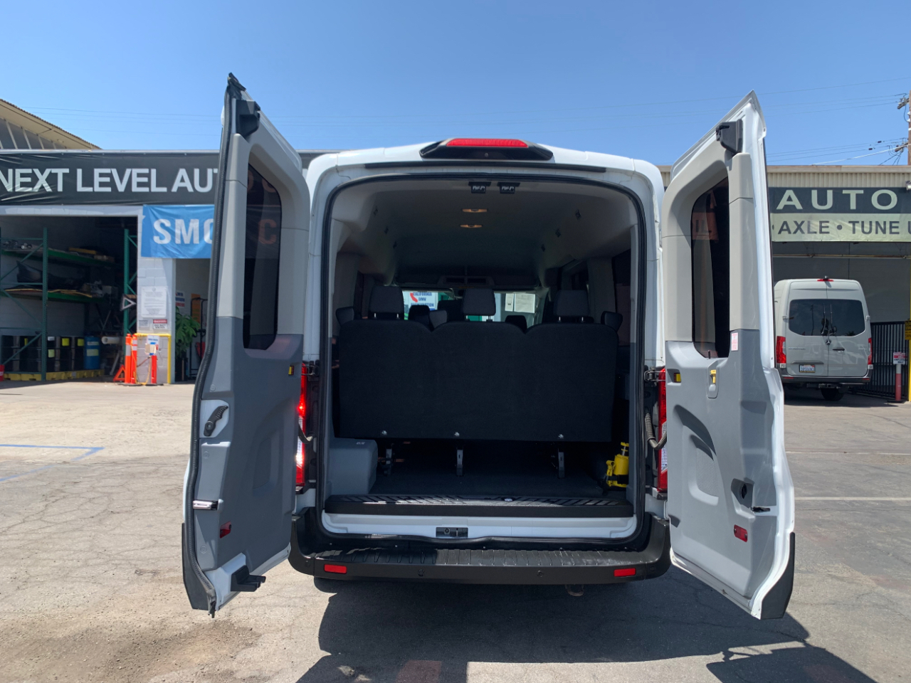 Ford Transit Passenger Wagon T-150 130" Med Roof XLT Sliding RH Dr 2019