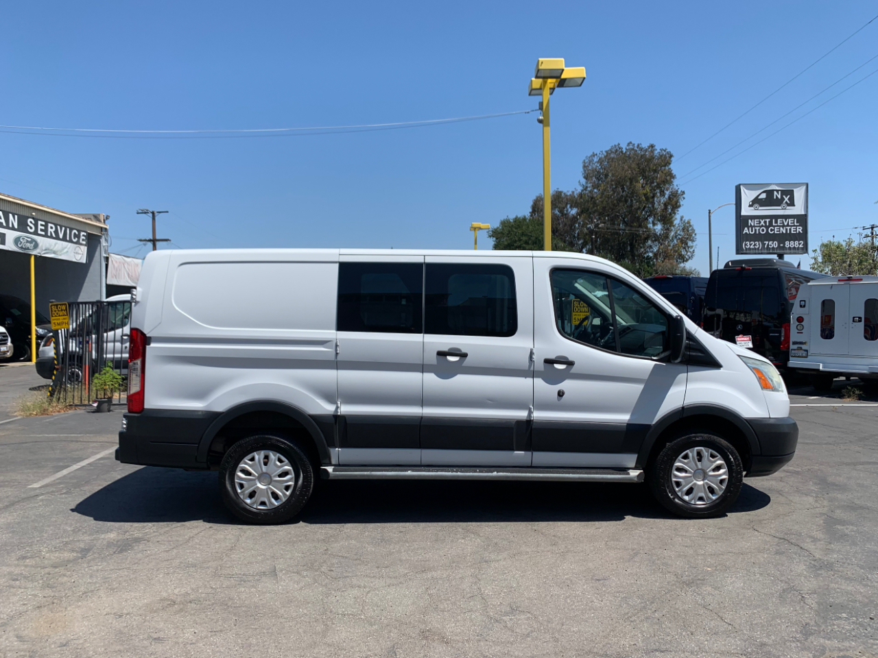 Ford Transit Cargo Van T-250 130" Low Rf 9000 GVWR Swing-Out RH Dr 2016