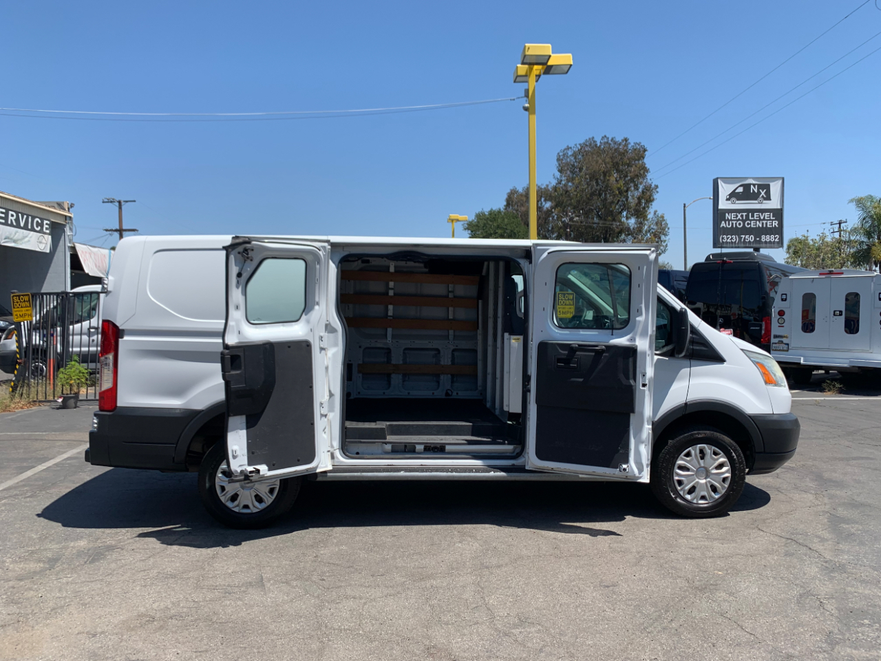 Ford Transit Cargo Van T-250 130" Low Rf 9000 GVWR Swing-Out RH Dr 2016