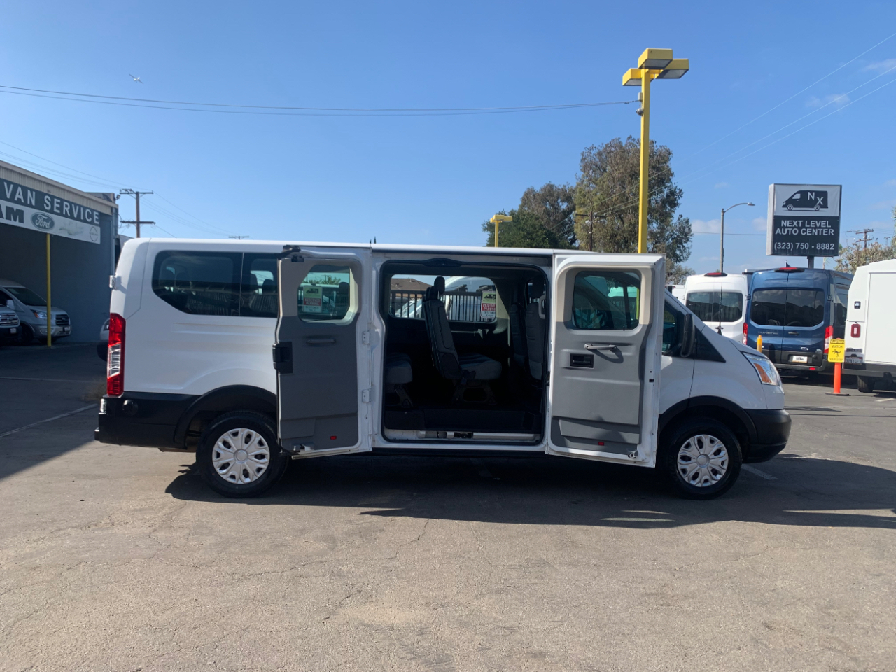 Ford Transit Passenger Wagon T-350 148" Low Roof XLT Swing-Out RH Dr 2019