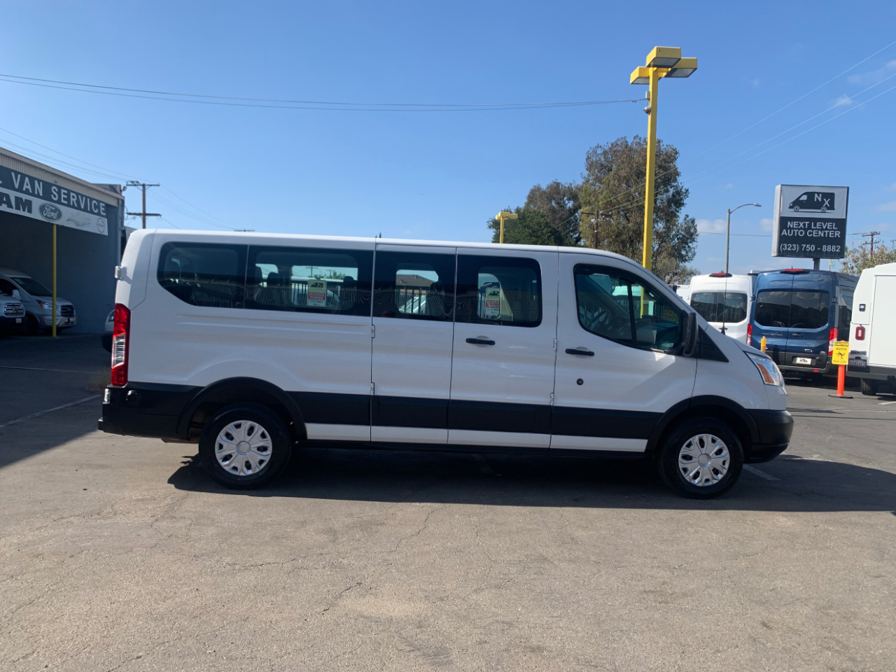 Ford Transit Passenger Wagon T-350 148" Low Roof XLT Swing-Out RH Dr 2019