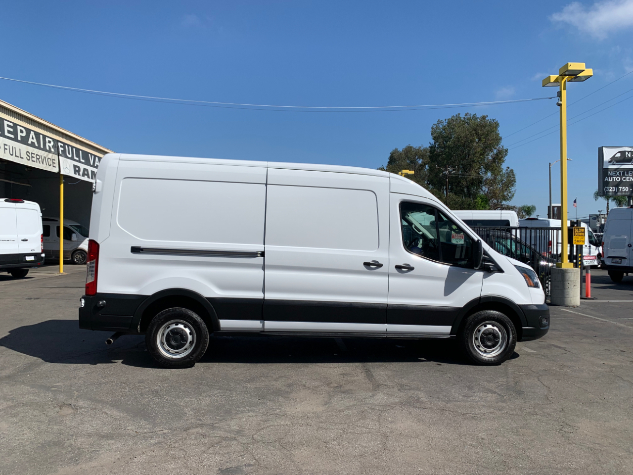 Ford Transit Cargo Van T-150 148" Med Rf 8670 GVWR RWD 2022