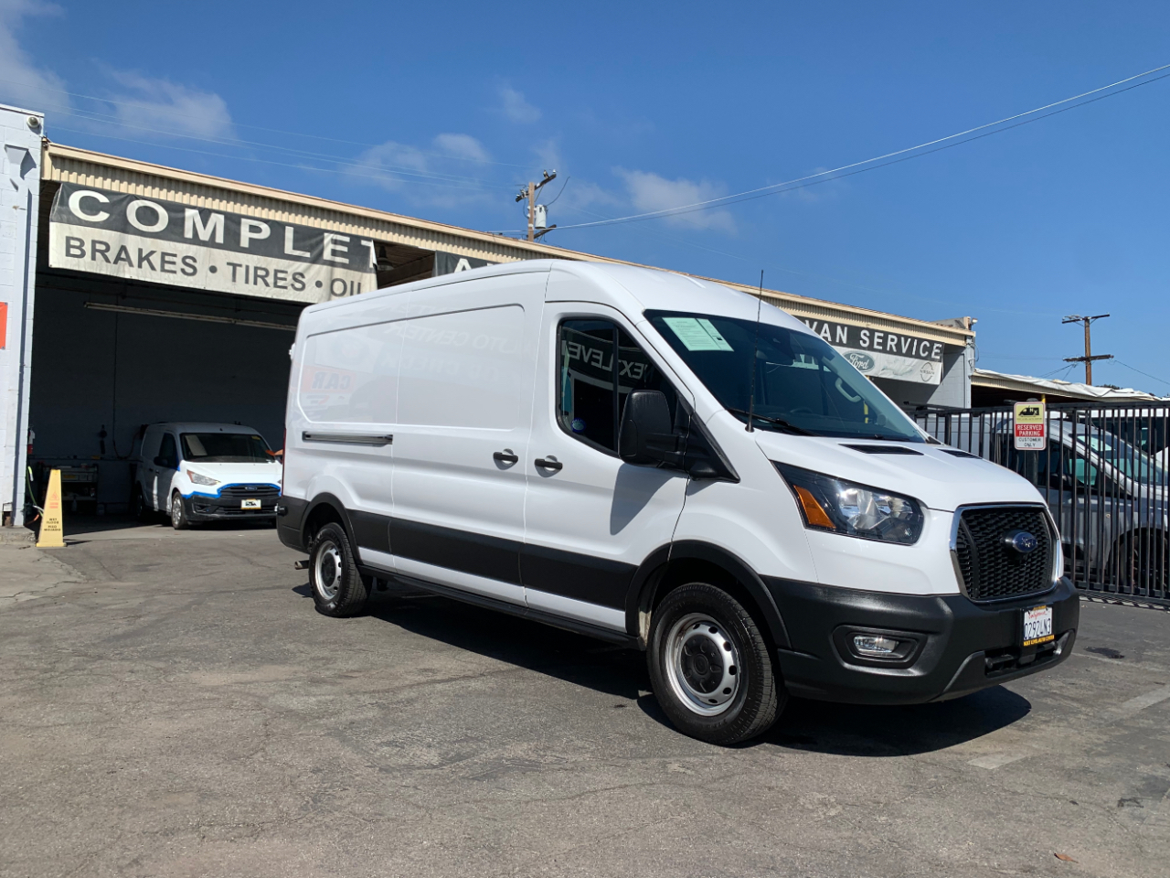 Ford Transit Cargo Van T-150 148" Med Rf 8670 GVWR RWD 2022