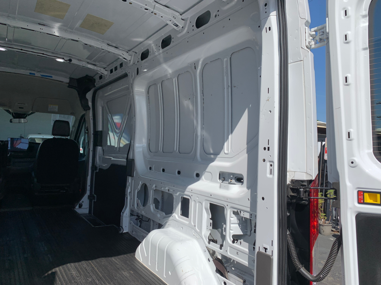 Ford Transit Cargo Van T-150 148" Med Rf 8670 GVWR RWD 2022