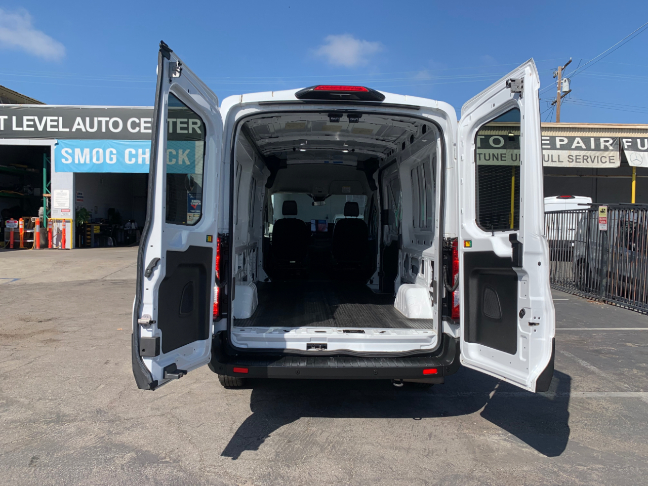 Ford Transit Cargo Van T-150 148" Med Rf 8670 GVWR RWD 2022