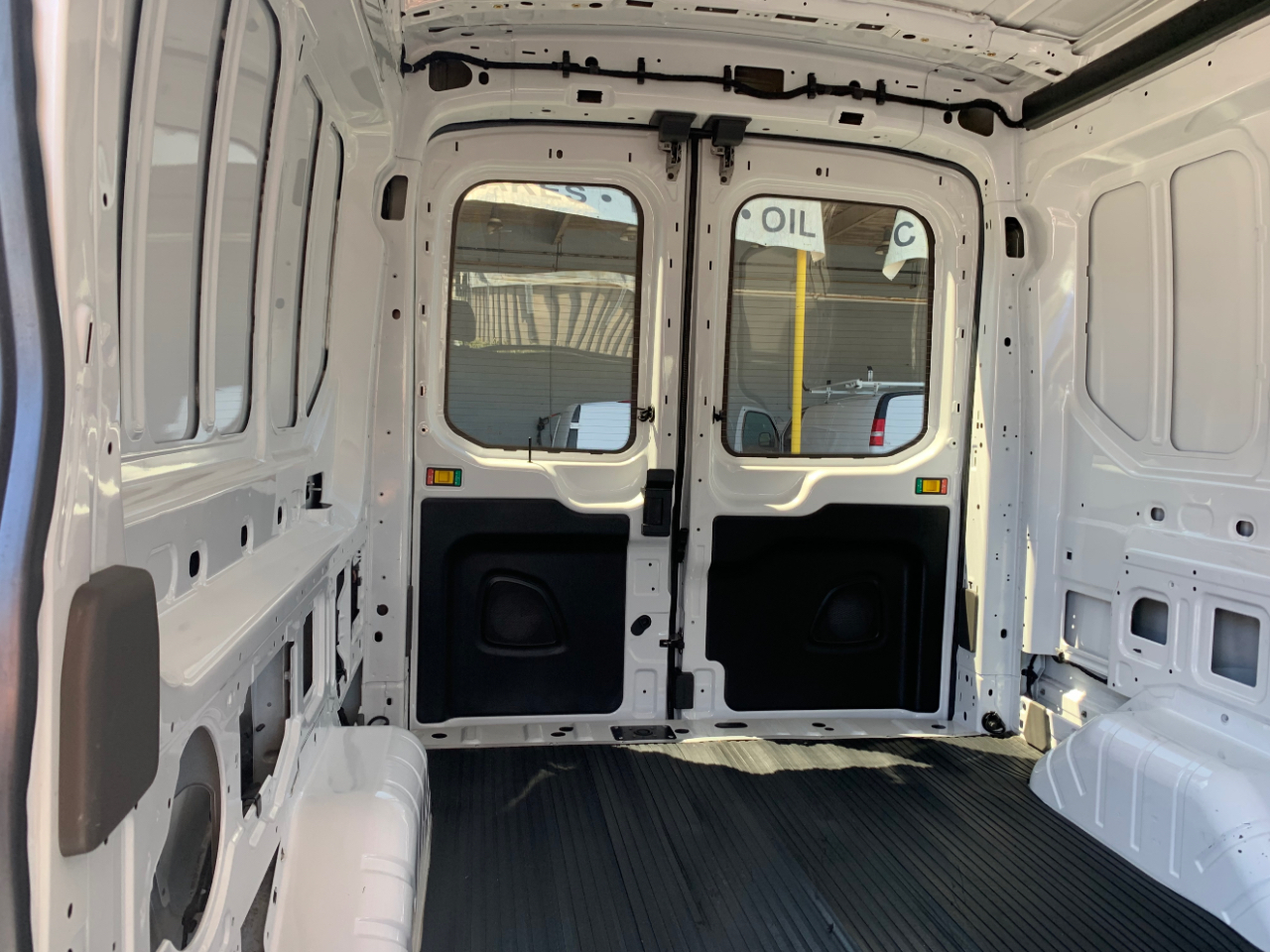 Ford Transit Cargo Van T-150 148" Med Rf 8670 GVWR RWD 2022