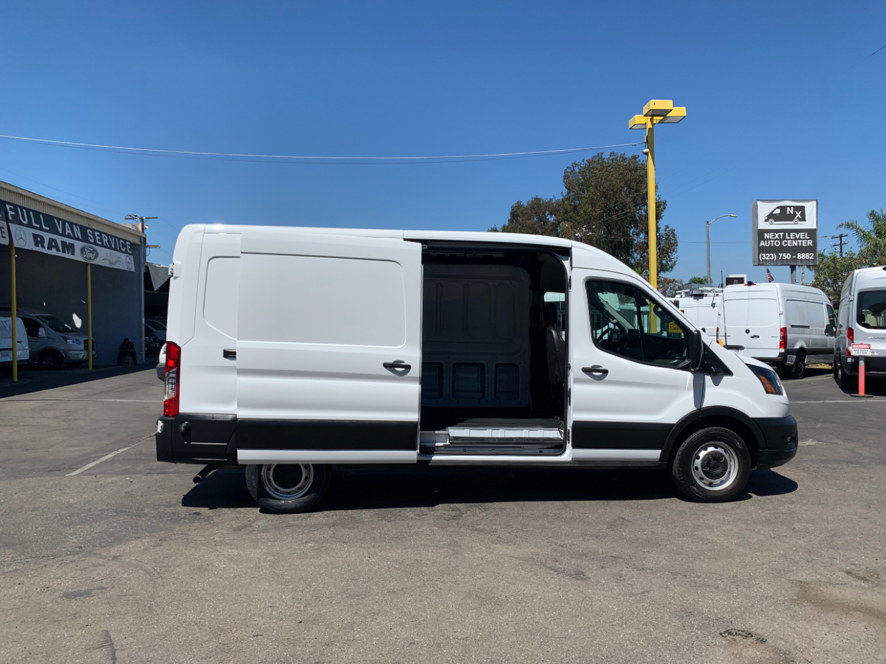 Ford Transit Cargo Van T-150 148" Med Rf 8670 GVWR RWD 2022