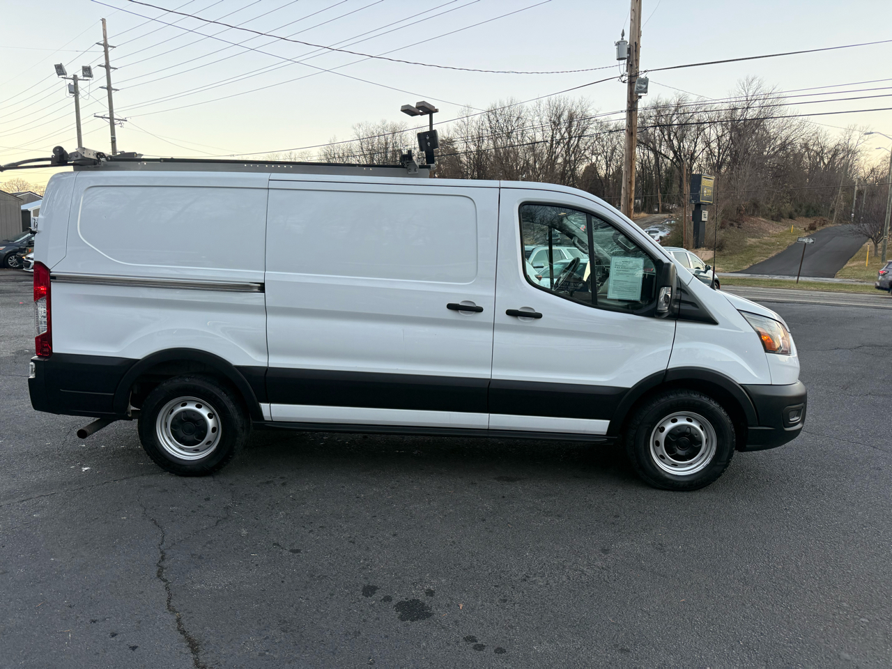Ford Transit Cargo Van T-150 130" Low Rf 8670 GVWR RWD 2021