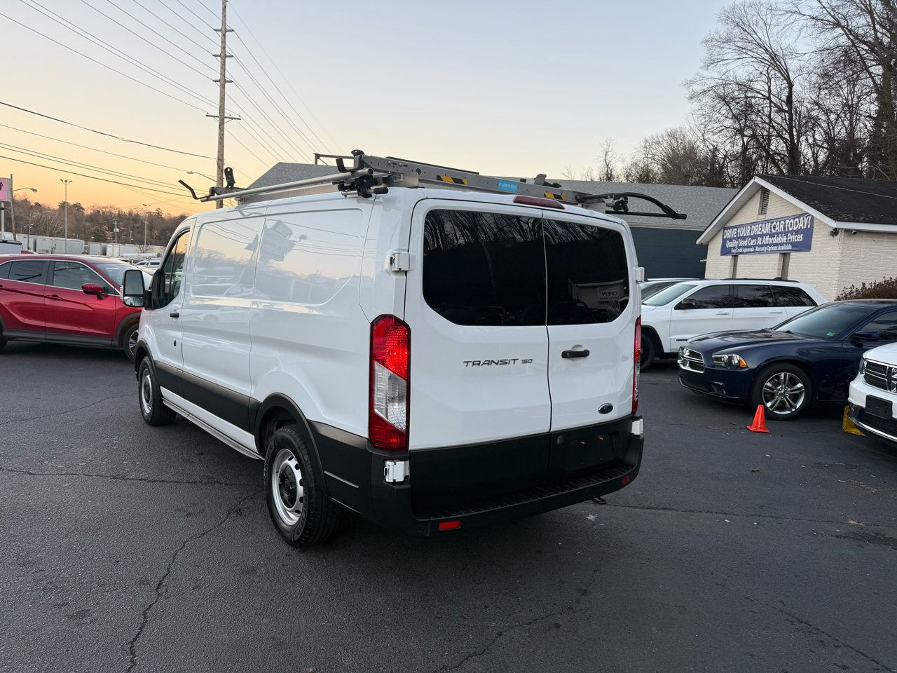 Ford Transit Cargo Van T-150 130" Low Rf 8670 GVWR RWD 2021